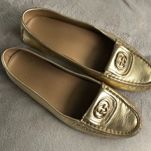 Gucci gold loafers